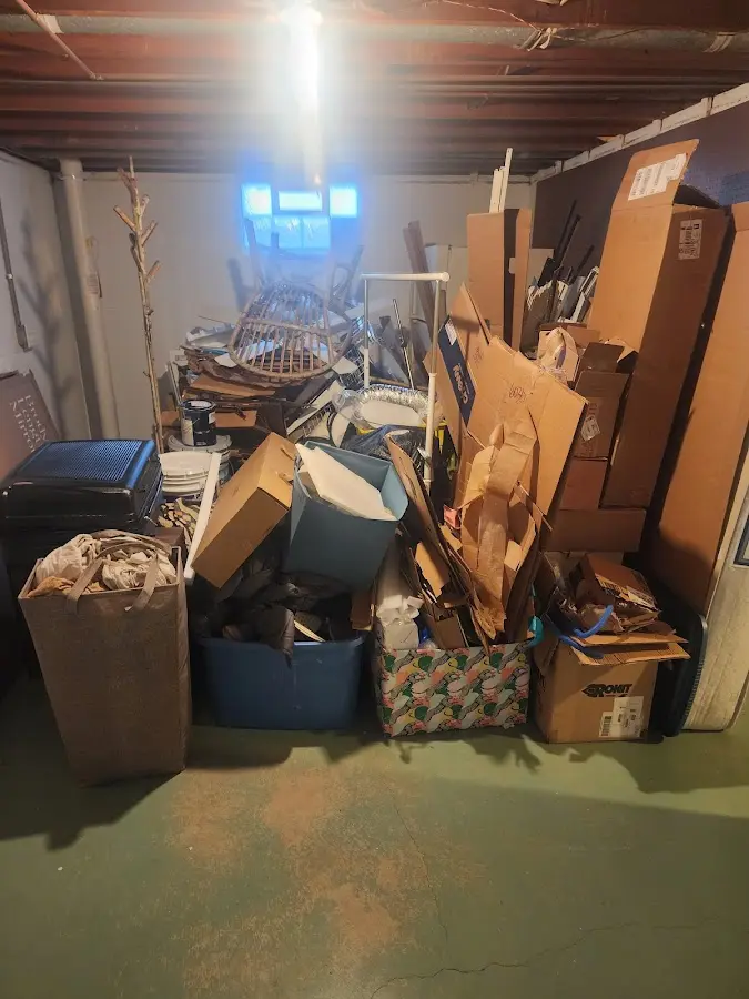 Roll-off dumpster container at job site for Construction Dumpster Rental in Beechwood